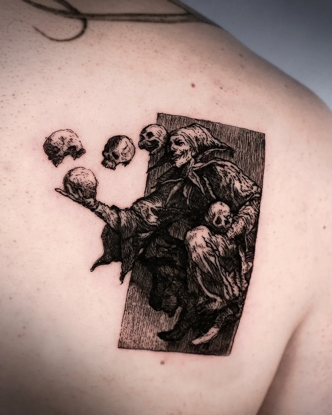 Detail of the jester woodcut tattoo